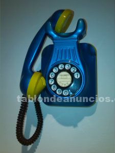 Teléfono baquelita decorado años 50.