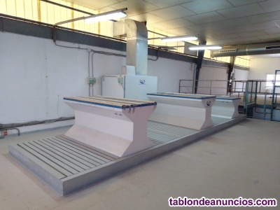 �rea de lijado con 3 mesas y suelo aspirante