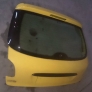 Porton trasero peugeot 206 color amarillo