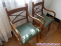 Dos sillones de madera maciza / tapizados