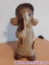 Figura de ceramica marron mate