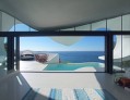 Esta villa con tejas de zinc dando la apariencia d