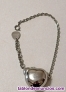 Fotos del anuncio: Vendo pulsera para mujer con forma de corazon de breil,en acero y cordon de acer