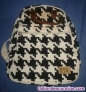 Mochila tela blanca y negra 