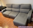 Sofa gris con chaise longue