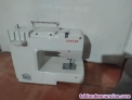 Maquina de coser singer