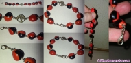 Fotos del anuncio: Pulsera  roja  y  negra  5  €