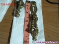 Antiguos tiradores de bronce