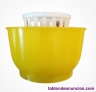 Escurre cuberteria de plastico redonda y de color amarillo y Blanco.